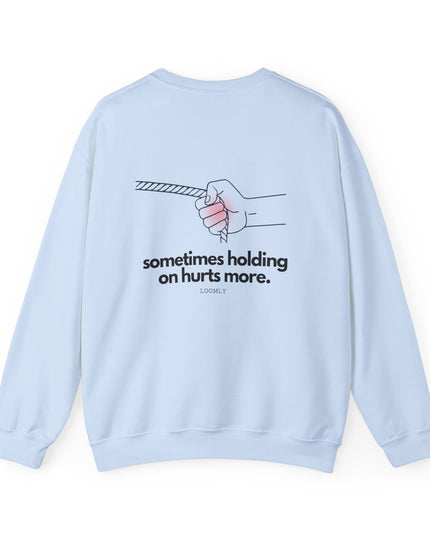 SOMETIMES HOLDING ON HURTS MORE.