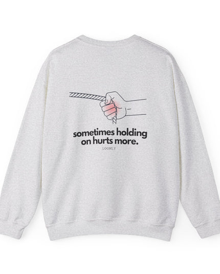 SOMETIMES HOLDING ON HURTS MORE.